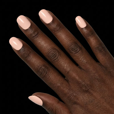 Short Squoval in Nude press-on nails on deep skin tone - Blushing Bride Instant Manicure.
