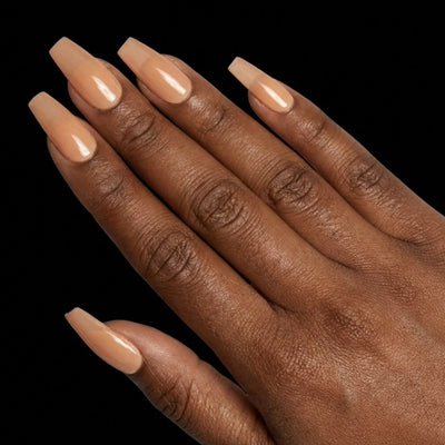 Short Coffin in Brown press-on nails on deep skin tone - Caramel Latte Instant Manicure.