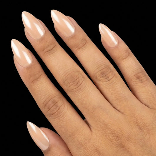 Short Almond in Nude press-on nails on light skin tone - Champagne Toast Instant Manicure.