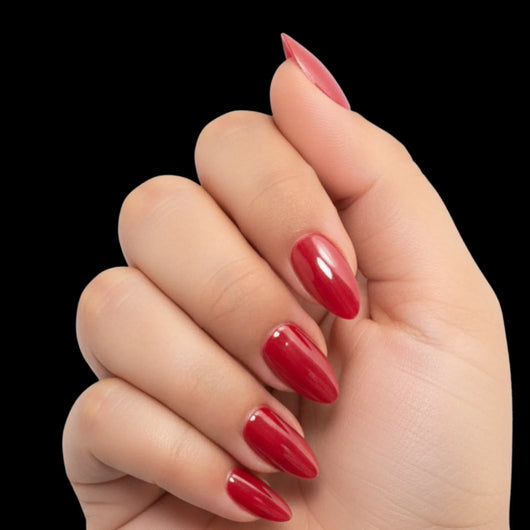 Bold Move press-on nail set - short almond nails in classic true red with glossy finish, dorsal view