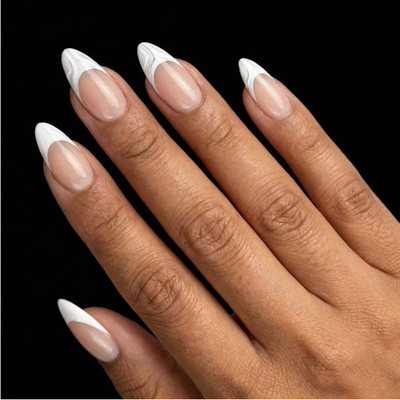 Short Almond in Nude French Tip press-on nails on medium skin tone - French Kiss Instant Manicure.