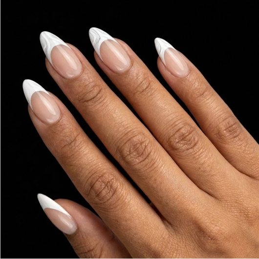Short Almond in Nude French Tip press-on nails on medium skin tone - French Kiss Instant Manicure.