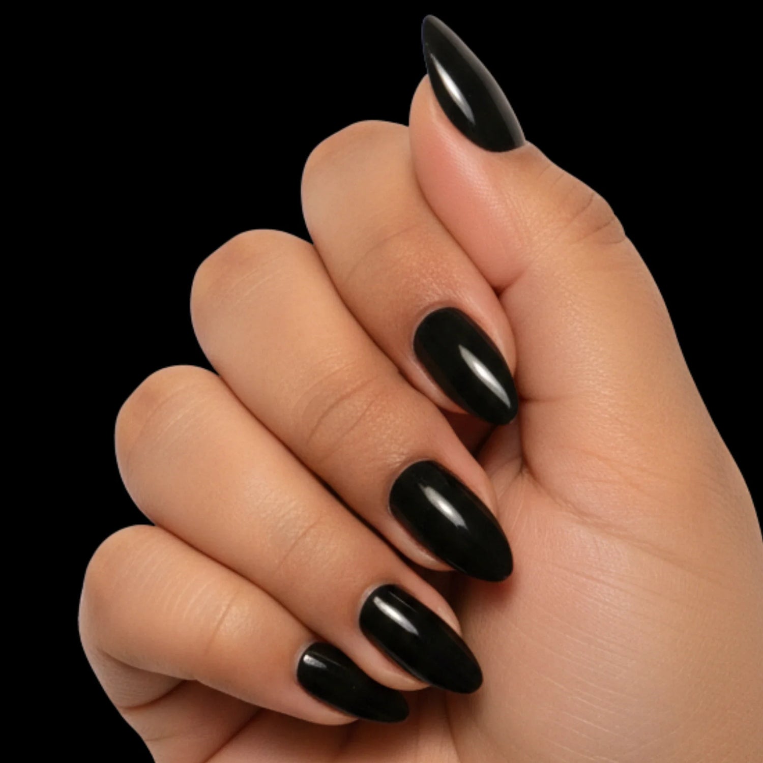 Midnight Glam press-on nail set - short almond nails in black with gold glitter accents, dorsal view