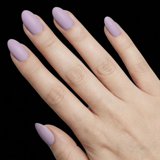 Short Oval in Lavender press-on nails on light skin tone - Lavender Fields Instant Manicure.