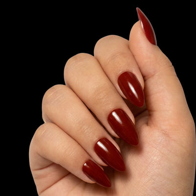 Spiced Cider press-on nail set - short almond nails in warm spiced cider-brown with glossy finish, dorsal view