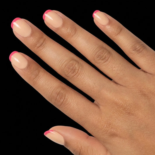 Short Squoval in Pink French Tip press-on nails on medium skin tone - Pink Pop Instant Manicure.
