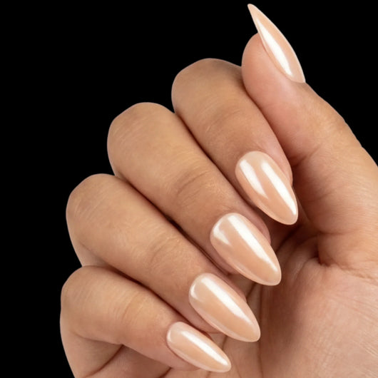 Champagne Toast press-on nail set - short almond nails in warm champagne-nude with glossy finish, dorsal view