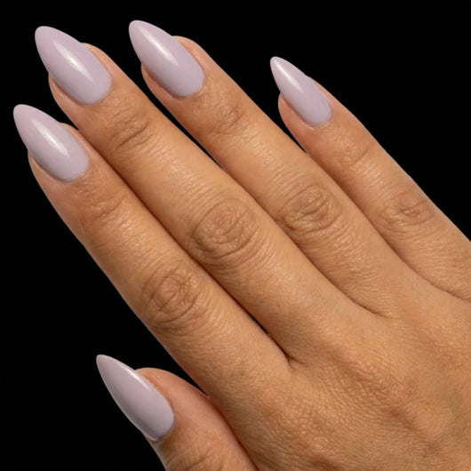 Short Almond in Lavender press-on nails on medium skin tone - Sweet Wisteria Instant Manicure.