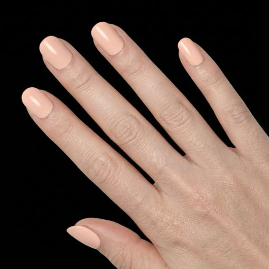 Short Squoval in Nude press-on nails on light skin tone - Blushing Bride Instant Manicure.