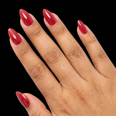 Short Almond in Red press-on nails on medium skin tone - Bold Move Instant Manicure.