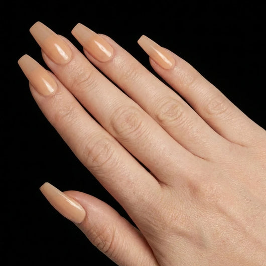 Short Coffin in Brown press-on nails on light skin tone - Caramel Latte Instant Manicure.
