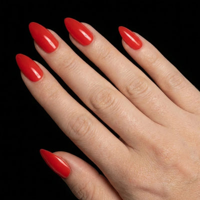 Short Almond in Red press-on nails on light skin tone - Cherry on Top Instant Manicure.