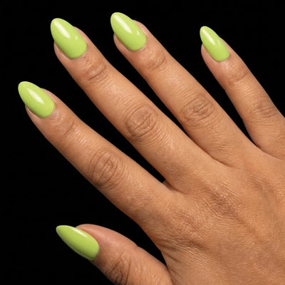 Short Oval in Green press-on nails on medium skin tone - Electric Lime Instant Manicure.