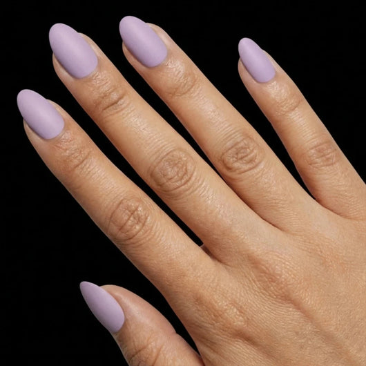 Short Oval in Lavender press-on nails on medium skin tone - Lavender Fields Instant Manicure.