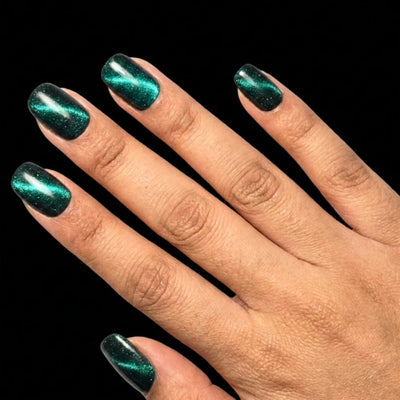Short Squoval in Teal press-on nails on medium skin tone - Midnight Lagoon Instant Manicure.