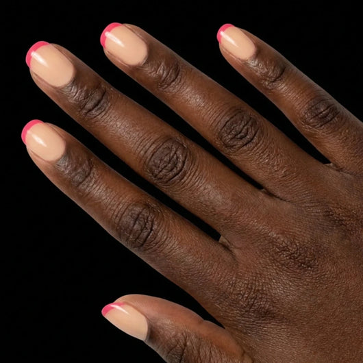 Short Squoval in Pink French Tip press-on nails on deep skin tone - Pink Pop Instant Manicure.