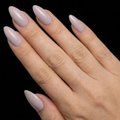 Short Almond in Lavender press-on nails on light skin tone - Sweet Wisteria Instant Manicure.